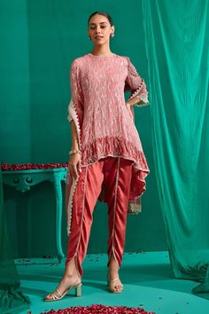 Rose pink two tone asymmetric kurta with all over sequin work. Paired with a draped tulip pant and dupatta with floral cutwork border. - Aza Fashions Designer Pink Pant Set With Dupatta, Festive Pink Pant Set With Traditional Drape, Traditional Pink Pant Set With Traditional Drape, Pink Pant Set For Navratri, Pink Festive Bottoms For Eid, Festive Pink Bottoms For Eid, Traditional Sets With Dupatta And Asymmetrical Hem, Eid Asymmetrical Hem Sets With Dupatta, Eid Sets With Dupatta And Asymmetrical Hem