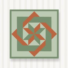 a green and orange square with an abstract design