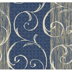 a blue and beige wallpaper with swirly designs on it's sides, in two different colors