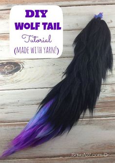 a long black and purple tail on top of a wooden table with text overlay