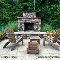 an outdoor fireplace with chairs around it