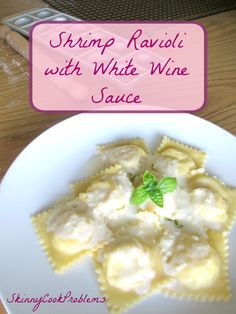 shrimp ravioli with white wine sauce on a plate