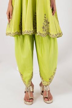 Lime green three fourth sleeves short anarkali with persian sequin-cutdana embroidery. Paired with a dhoti style salwar and sequin bloom scallop border embroidered dupatta. - Aza Fashions Green Churidar With Mirror Work For Navratri, Green Mirror Work Churidar For Navratri, Fitted Pista Green Kurta With Gota Work, Fitted Pista Green Salwar Kameez With Mirror Work, Pista Green Fitted Churidar With Resham Embroidery, Fitted Green Churidar With Resham Embroidery, Green Churidar For Navratri, Fitted Green Kurta With Mirror Work, Green Fitted Churidar For Festivals