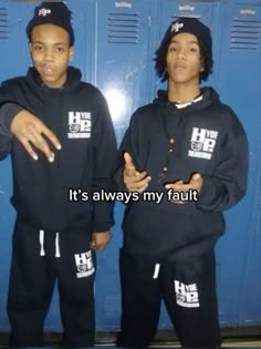 two young men standing next to each other in front of lockers with the caption it's always my fault