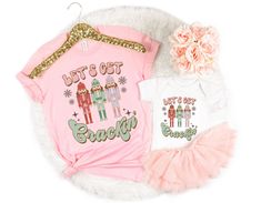 Looking for the perfect mommy and me Christmas shirt? Look no further! Our selection of matching shirts and outfits will have you looking like a superstar on Christmas morning.This cute pink Santa design is sure to put a smile on everyone's face. * S I Z I N G * ✺ Sizing is unisex  ✺ For adults, size runs like men's, though not overly large. Most women find their typical size works best, since they are meant to fit a touch loose and go up 1 or 2 sizes if you want the oversized look. ✺ Size guide and fit:  The size chart is listed in photos above.  Please use the measurement for the most accurate sizing. ✺ Product color may slightly vary due to photographic lighting sources or your monitor settings  * PRINT INFO * ✺ Printed with DTG - Direct to Garment Printing - which is different than vin Mommy And Me Christmas Shirts, Mommy And Me Christmas, Nutcracker Shirt, Ballet Shirts, Pink Nutcracker, Little Sister Gifts, Mom And Me, Pink Santa, Nutcracker Ballet