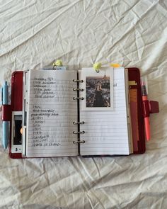 an open notebook with some writing on it