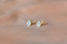 *** We are actively working on restocking the missing sizes, please add yourself to the waiting list and you will be notified by email as soon as the rings are restocked in the next two weeks.***This stunning delicate Moonstone Ring is handmade with genuine natural faceted moonstone in an oval shape in 925 sterling silver & 18k Gold Vermeil. An everyday classic piece of jewelry with a touch of modern, you will never regret investing in. Every stone has a subtle blue flash on its smooth surfa Minimalist Gold Moonstone Ring, Adjustable 14k Gold Minimalist Moonstone Ring, Adjustable Minimalist 14k Gold Moonstone Ring, Minimalist Yellow Gold Opal Ring, Elegant Everyday Open Moonstone Ring, Everyday Dainty Moonstone Ring, Minimalist 14k Gold Moonstone Birthstone Ring, Minimalist Yellow Gold Moonstone Ring For Everyday, Minimalist Yellow Gold Midi Rings With Gemstone