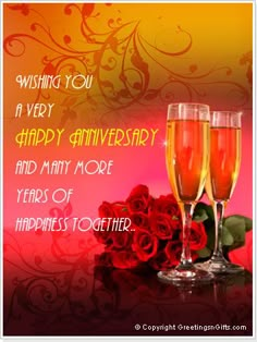 two glasses of champagne and roses on a table with the words wishing you a very happy anniversary and may more years of happiness together