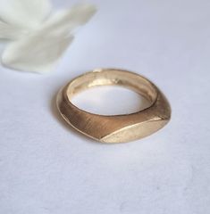 "Classic signet ring in a marquise design, dainty minimalist pinky ring jewelry for women, available in 14k gold plating or sterling silver. This delicate handmade gold ring is elegant and minimalist. It was made by carving wax and casting it into metal.  It is available in high-quality 14k gold plating or sterling silver. This ring is very comfortable to wear and great for everyday use, and will never go out of style. It can also be a great pinky ring. Get this timeless signet ring- you'll neve Modern Minimalist Jewelry, Wax Carved Signet Ring, Timeless Gold Marquise Cut Ring, Modern Gold Marquise Cut Jewelry, Modern Marquise Cut Gold Jewelry, Timeless Gold Marquise Rings, Timeless Marquise Gold Rings, Gold Marquise Jewelry For Promise Ring, Modern Gold Marquise Cut Ring