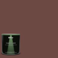 a can of marquee paint on a dark brown background with the words marquee