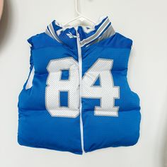 Do you have a favorite sports team or college? I’ll make you a one of a kind puffer vest from a jersey, jacket, flag, etc. I can you items you have or sources the items for you. The process 1. Order a custom puffer vest 2. Select a size. 3. I’ll email you with instructions on how to get your items to me or we will talk about a design so I can source the items for you with in 48 hours of ordering. 4. Process takes about 4 weeks. (If you need your item sooner please reach out). 5. let the creative Jersey Jacket, French Guiana, 3 I, Cayman Islands, Seychelles, Puffer Vest, Mauritius, Equatorial Guinea, Papua New Guinea