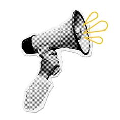 a hand holding a yellow and black megaphone