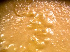 a close up view of some liquid in a bowl