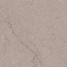 a close up view of the surface of a concrete slab with small speckles