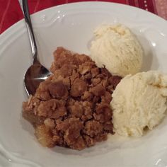 two scoops of ice cream on a white plate