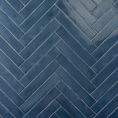 an image of a blue herringbone tile pattern that looks like it is going to be painted