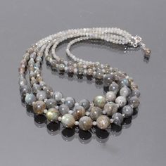 "PRODUCT DETAIL : ITEM : LABRADORITE BEADED NECKLACE ITEM CODE : DGC3040 ITEM NAME :NECKLACE GEMSTONE : LABRADORITE BEADS SHAPE : ROUND LENGTH : 19\"-22\"+ 2\" inch Chain APPROX BEADS SIZE: 3.5mm/6.5-12mm Approx WEIGHT : 410 Cts. APPROX CUSTOMIZATION/BULK ORDER : AVAILABLE PLEASE FEEL FREE TO CONTACT IF YOU REQUIRE ANY FURTHER INFORMATION." Elegant Beaded Necklaces With Round Labradorite Beads, Elegant Labradorite Beaded Necklaces With Round Beads, Labradorite Beaded Round Necklaces, Labradorite Beaded Necklaces For Jewelry Making, Adjustable Labradorite Necklaces With Round Beads, Labradorite Round Beads Necklace, Adjustable Gray Necklace With Gemstone Beads, Adjustable Gray Gemstone Beads Necklace, Adjustable Gray Gemstone Beaded Necklace