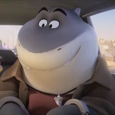 a cartoon hippo is sitting in the back seat of a car and has his eyes wide open