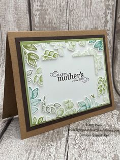 a close up of a card with leaves on it and the words, happy mother's day