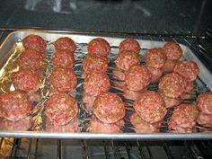 some meatballs are cooking in an oven