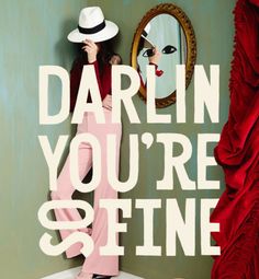 a woman standing in front of a mirror with the words darlin you're so fine