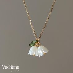 ~ Welcome to Vachana Jewellery ~ ✧ See our shop announcement for promotions, new product & updates ✧       ------------------------------------- ✧ All of our jewellery items are nickel, cadmium and lead free ✧      ------------------------------------- ✿ Product Description ✿ - Acrylic flower and leaf - Necklace: 18k gold plated on stainless steel long 41cm + extender 7cm      ------------------------------------- ✿ Packaging ✿ - Card mounted, transparent plastic sleeve  - Craft box & Padded envelope outer packaging ♡ Perfect for a gift ♡      ------------------------------------- ✿ Delivery ✿ - Same or next day dispatch (excluding Saturday) - UK: Royal Mail tracked 48hr or equivalent [Upgrade to tracked 24hr available] - US and Europe: Royal Mail tracked 3-7 days      -------------------- White Flower Pendant Necklace With Clavicle Chain, White Flower Necklace With Adjustable Chain, White Flower Clavicle Chain Necklace, White Flower Necklace With Delicate Chain For Gift, White Flower Necklace With Delicate Chain As Gift, Delicate White Flower Pendant Necklace, Lily Of The Valley Necklace, Gold Leaf Jewelry, Packaging Card