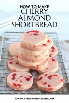 cherry almond shortbread cookies stacked on top of each other with the words easy cookie recipe cherry almond shortbread cookies