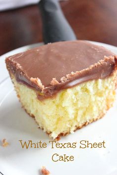 a white texas sheet cake with chocolate frosting on top and the words, white texas sheet cake