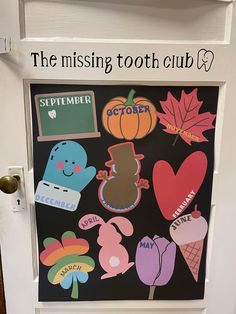 the missing tooth club door is decorated with fall themed stickers and paper cutouts