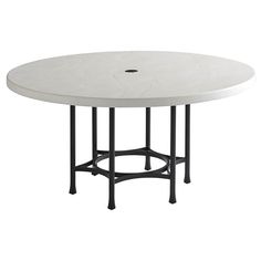 a white table with black legs and a circular top on an isolated surface, viewed from the side