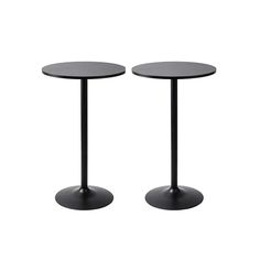 two black round tables sitting next to each other