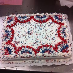 a cake with red, white and blue frosting