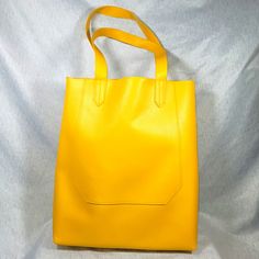 Saks Fifth Avenue Large Yellow Tote Bag. New Without Tags. Dimensions: 15" X 13" X 5" Trendy Large Satchel For Shopping, Yellow Rectangular Satchel For Errands, Yellow Satchel With Handles For Errands, Yellow Square Satchel For Daily Use, Modern Yellow Bag For Errands, Modern Yellow Satchel For Shopping, Modern Yellow Tote Bag, Modern Yellow Satchel With Large Capacity, Yellow Bags With Large Capacity For Shopping