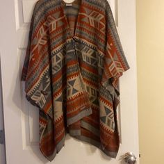 Beautiful Women’s Shaw/Poncho. Button Closure And Button Closure On Sides. Tan, Gray, Burnt Orange Colors. New Without Tags. Very Soft. Knit Poncho Sweater, Black Poncho, Mustard Sweater, Aztec Style, Poncho Cardigan, Aztec Fashion, Wool Poncho, Boho Sweater, Fringed Poncho