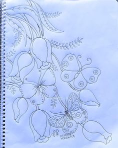 a drawing of flowers and butterflies on a sheet of paper