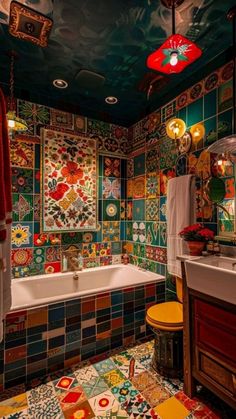 a bathroom with colorful tiles on the walls and floor, along with a bathtub