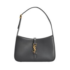 Saint Laurent "Le 5 À 7"  monogram hobo bag in smooth calf leather. Shoulder bag that tucks under the arm for a sleek, retro-chic look. Adjustable shoulder strap, 8" drop Center flap top with YSL logo, tab closure. Gold-tone hardware. Interior, zip pocket. Approx. 9"H x 6.2"W x 2.5"D. Weighs approx. 0.7lbs/ 0.3kg. Made in Italy. 5 A 7 Ysl, Ysl Shoulder Bag, Greyish Brown, Ysl Logo, Hobo Shoulder Bag, The Saint, Retro Chic, Leather Hobo, Hobo Bag