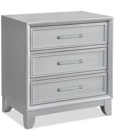 a silver nightstand with three drawers on it