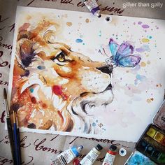 a watercolor painting of a lion with a butterfly on its nose