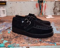 Iconic style that won’t quit. The timeless creeper that you know and love that features a new sleeker sole that is more lightweight and flexible than ever. Features a low platform height that is approximately 1 1/4” at the heel and 3/4” in the front and is made of a mixture of EVA and rubber that contributes to the sole’s bendability. Has an-all black upper made of faux suede. Comes with removable memory foam insoles for added comfort. Puma Platform Sneakers, Shoes Outlet, Girls Boots, Cute Fits, Creepers, Shoe Store, D Ring, Vegan Friendly, Puma Sneaker