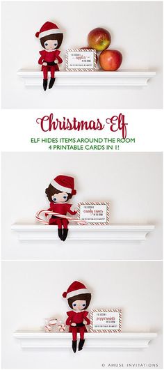 two christmas elfs sitting on top of a shelf next to apples and an envelope