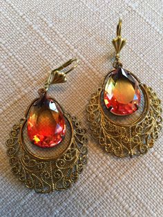 Gorgeous Austria Khaki Orange Crystal Pendant and Antique  Filigree Finding Earrings Leverback Closure.  Size  :    2  inches              (5cm) Faberge Jewelry, Pretty Accessories, Antique Filigree, Orange Crystals, Crystal Pendant, Crystal Earrings, Austria, Jewelry Earrings Dangle, Etsy Earrings