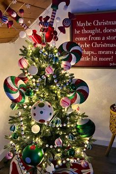 a christmas tree decorated with candy canes and ornaments