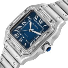 Cartier Santos Blue Dial Diamond Steel Mens Watch W4SA0006 Box Card. Automatic self-winding movement. Stainless steel case 35 mm. Protected octagonal crown set with a faceted blue synthetic spinel. Original Cartier factory diamond bezel punctuated with 8 signature screws. Scratch resistant sapphire crystal. Blue sunray dial with raised radial Roman numerals. Inner minute track. Luminous sword-shaped hands. Stainless steel bracelet punctuated with signature screws. Push button deployant clasp. Fi Formal Blue Diamond Watch With Subdials, Classic Blue Diamond Watch With Metal Dial, Blue Luxury Automatic Diamond Watch, Blue Automatic Diamond Watch, Classic Blue Cartier Watch, Blue Classic Cartier Watch, Timeless Blue Cartier Watch, Cartier Santos, Gold Watch Men