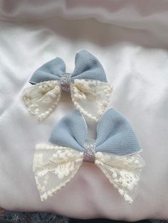 The 'Pretty in Bows' baby blue double-layered  Hair bow- Pretty lil things By Amulya  This pastel coloured hair bow clip features a delicate lace fabric in a soft shade of blue, with the intricate lace designing adding a touch of elegance, making it both whimsical and sophisticated and suitable for various occasions. Colour : Baby blue Material- lace Type- Alligator clip type double layered hair bow. Pack of 2 clips Size- Small (S) Ideal for - Kids, girls Baby Blue Hair, Blue Hair Bow, Blue Hair Bows, Hair Color Pastel, Blue Accessories, Bow Clip, Mini Bows, Clip Hair, Bow Hair Clips