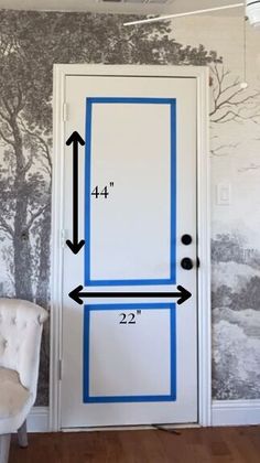 a door with an arrow pointing to the left and another line going through it in front of a tree wallpapered wall