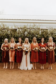 a group of women standing next to each other