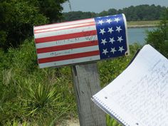 a mailbox with an american flag painted on it