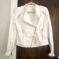 New With Tags, Never Worn White Moto Jacket From Blank Nyc. Has Mesh Cutouts For Breathability. Many Cute Silver Zipper Details. Two Buttons At The Top. Perfect For Almost Any Season! Casual White Leather Jacket With Zipper Closure, Casual White Leather Jacket With Zipper, White Leather Jacket With Zipper Closure, White Zipper Closure Outerwear For Work, White Biker Jacket With Zipper For Spring, White Leather Jacket For Spring Workwear, Spring White Leather Jacket For Work, Casual White Biker Jacket For Fall, White Spring Outerwear With Zipper Closure