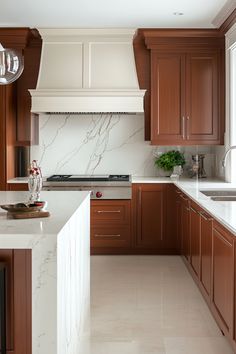 a kitchen with marble counter tops and wooden cabinets